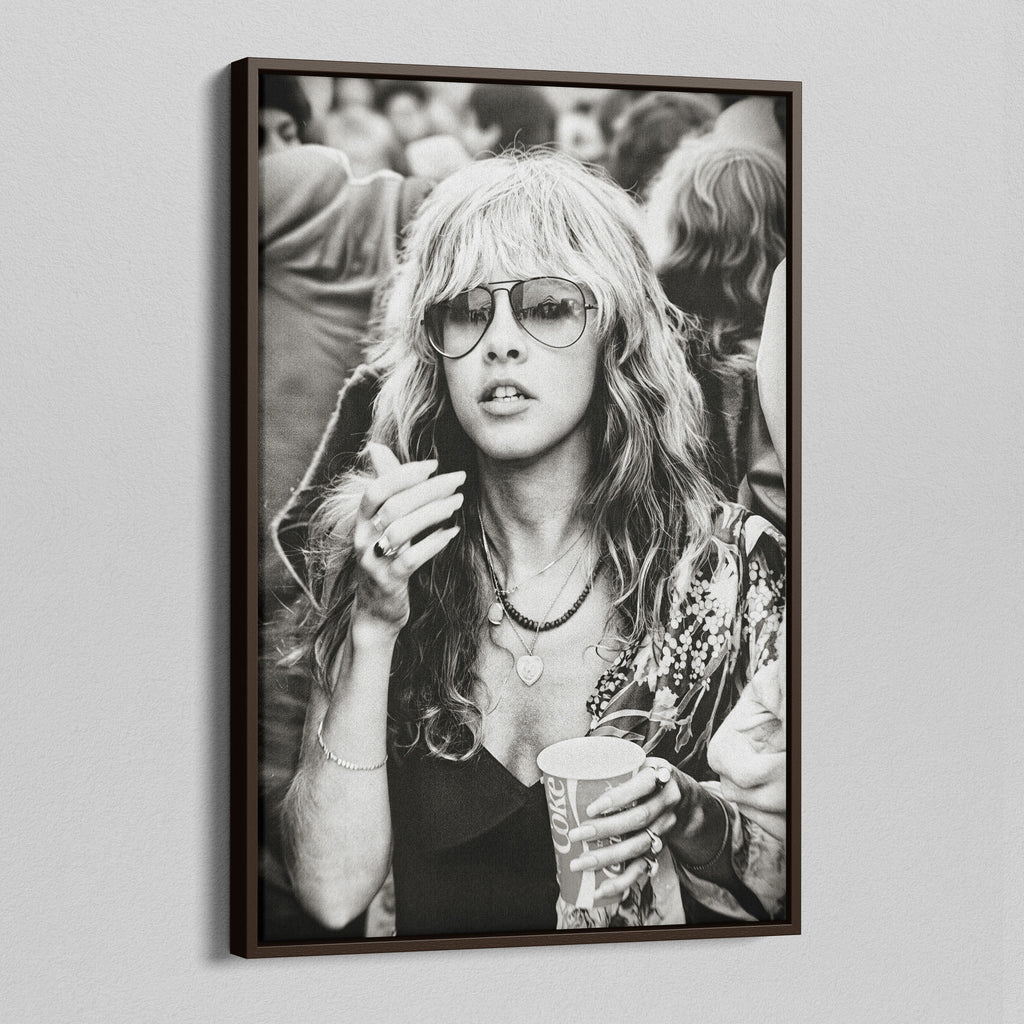 Angled view of the Stevie Nicks 1979 Tusk Tour black and white canvas in a dark walnut floating frame