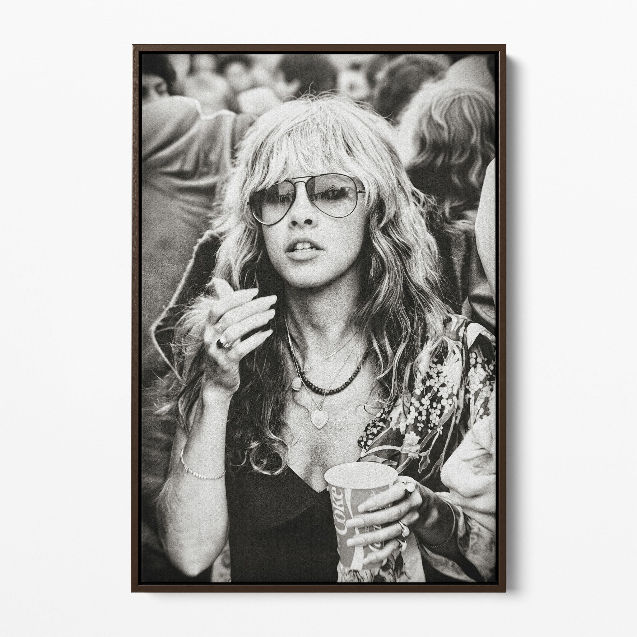 Front view of the Stevie Nicks 1979 Tusk Tour black and white canvas in a dark walnut floating frame