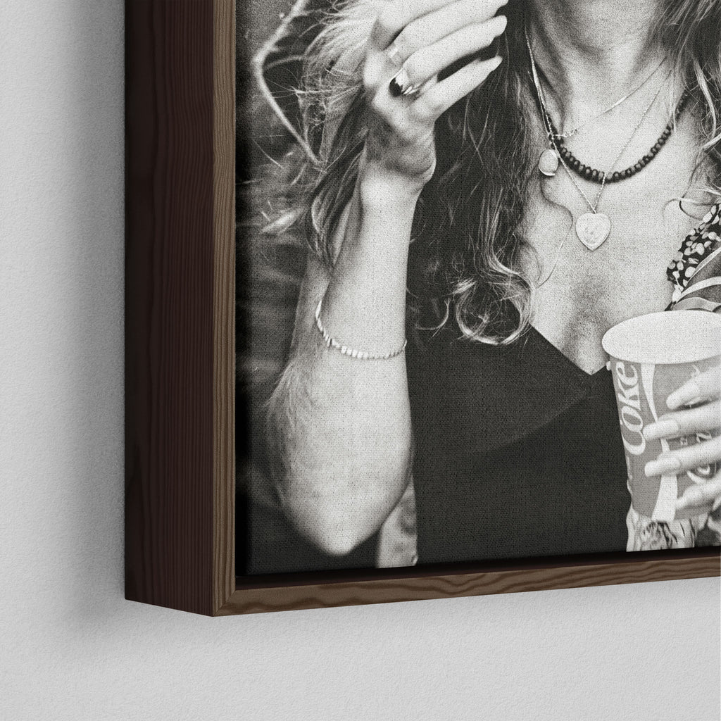 Corner close-up of the dark walnut floating frame on the Stevie Nicks 1979 Tusk Tour black and white canvas