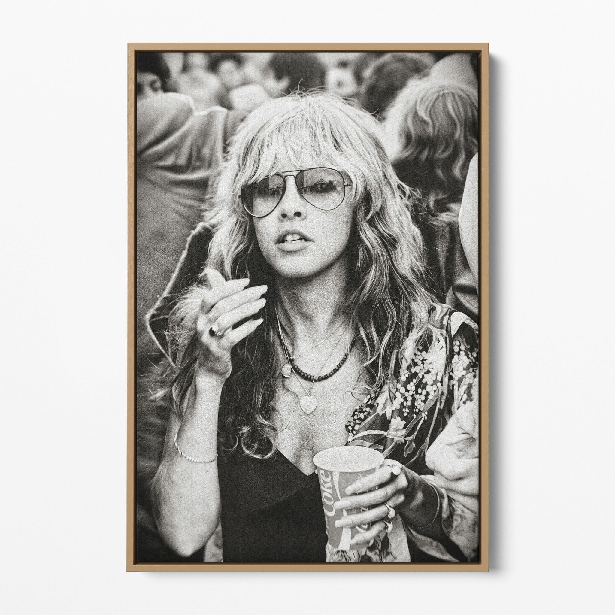 Front view of the Stevie Nicks 1979 Tusk Tour black and white canvas in a natural oak floating frame