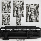 Wall art size comparison chart displaying multiple print dimensions above an average 3-seater sofa