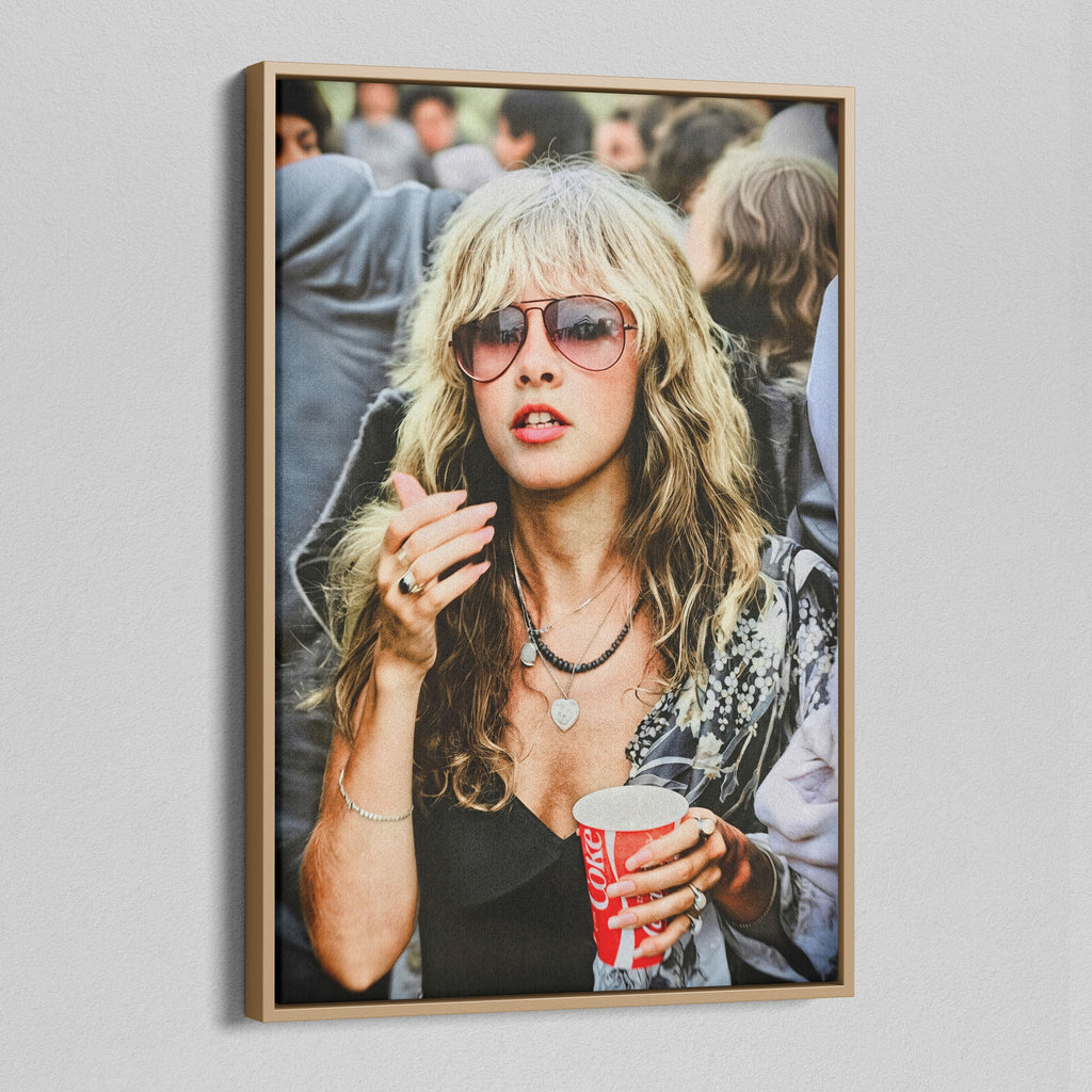 Angled view of the Stevie Nicks 1979 Tusk Tour colour canvas in a natural oak floating frame