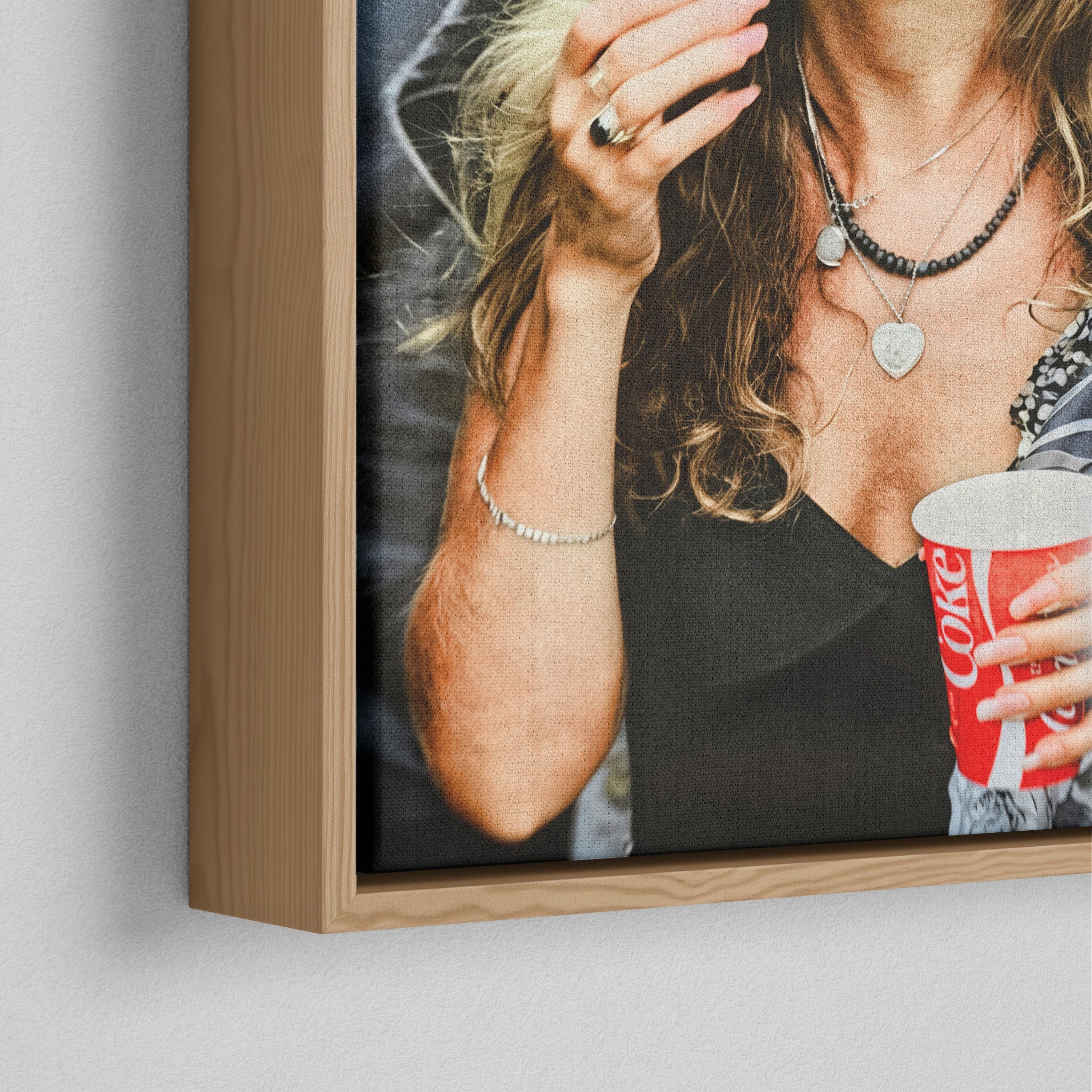 Corner close-up of the natural oak floating frame on the Stevie Nicks 1979 Tusk Tour colour canvas