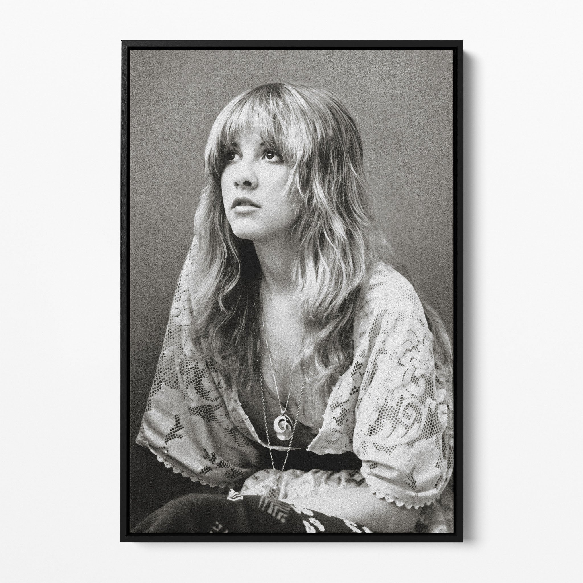 Front view of the Stevie Nicks 1976 black and white portrait canvas in a black floating frame