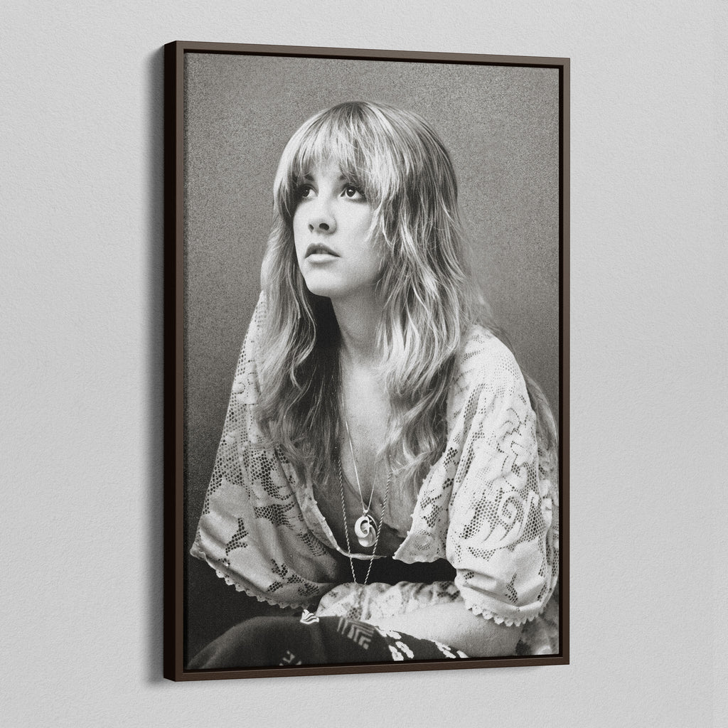Angled view of the Stevie Nicks 1976 black and white portrait canvas in a dark walnut floating frame