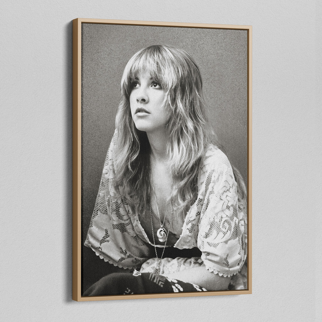 Angled view of the Stevie Nicks 1976 black and white portrait canvas in a natural oak floating frame