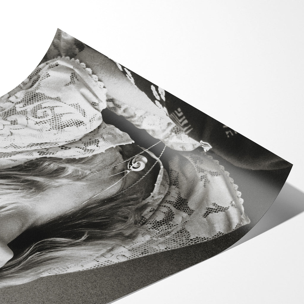 Angled close-up of the unframed Stevie Nicks 1976 black and white portrait poster showing paper detail