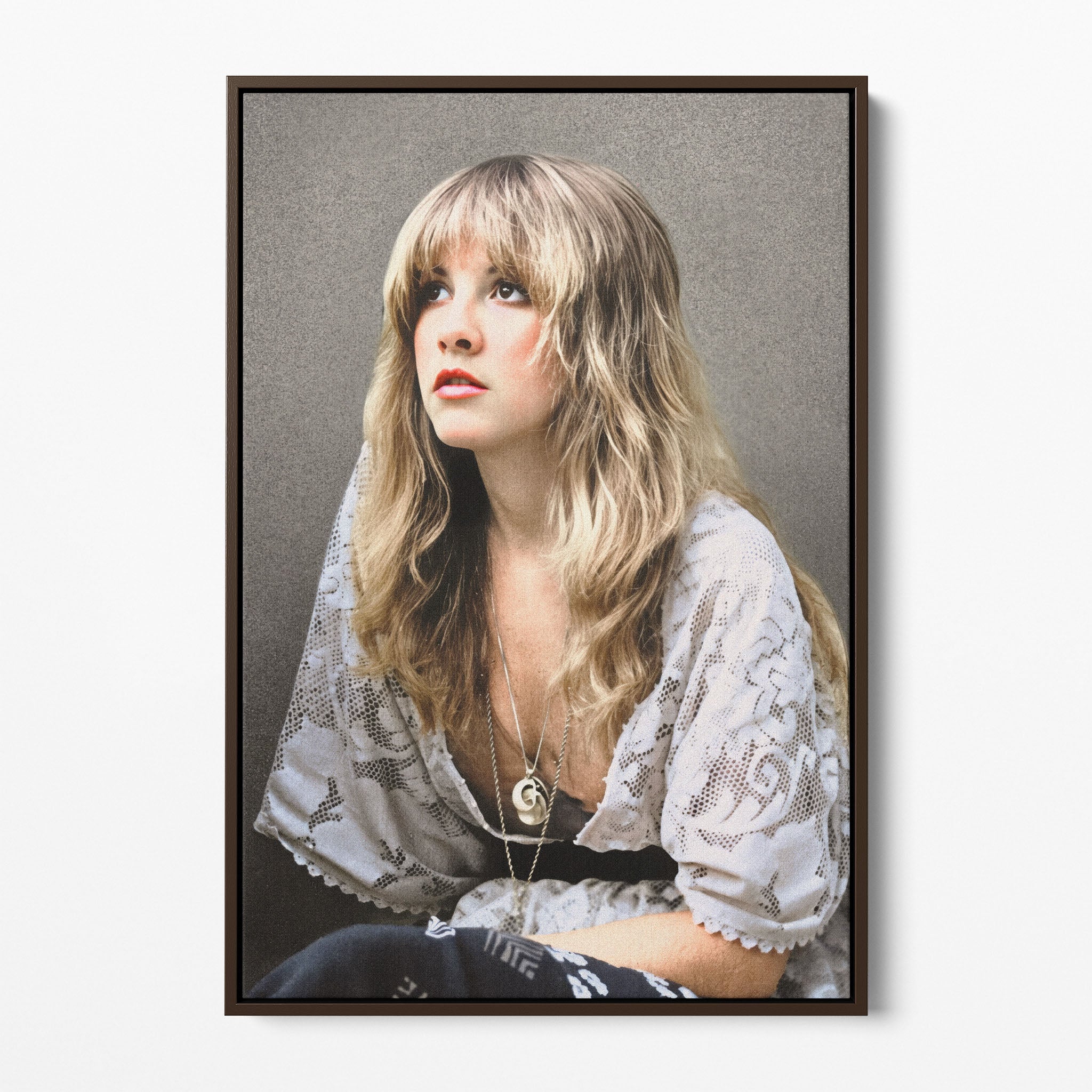 Front view of the Stevie Nicks 1976 colour portrait canvas in a dark walnut floating frame