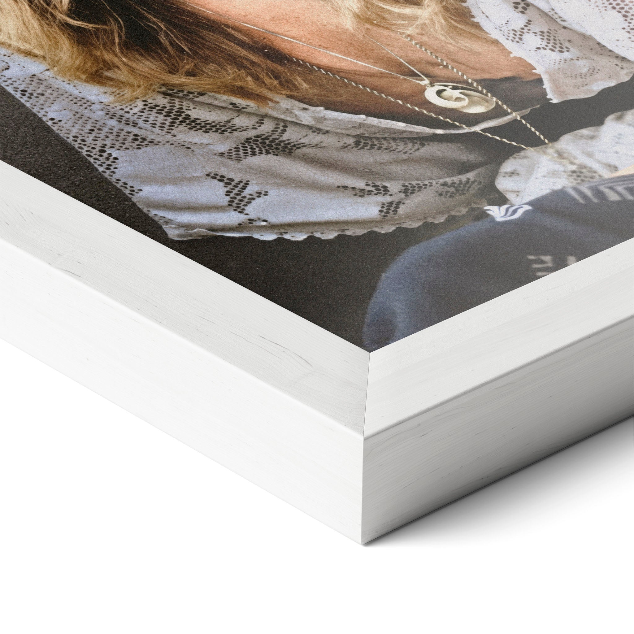 Corner close-up of the Stevie Nicks 1976 colour portrait in a classic white frame