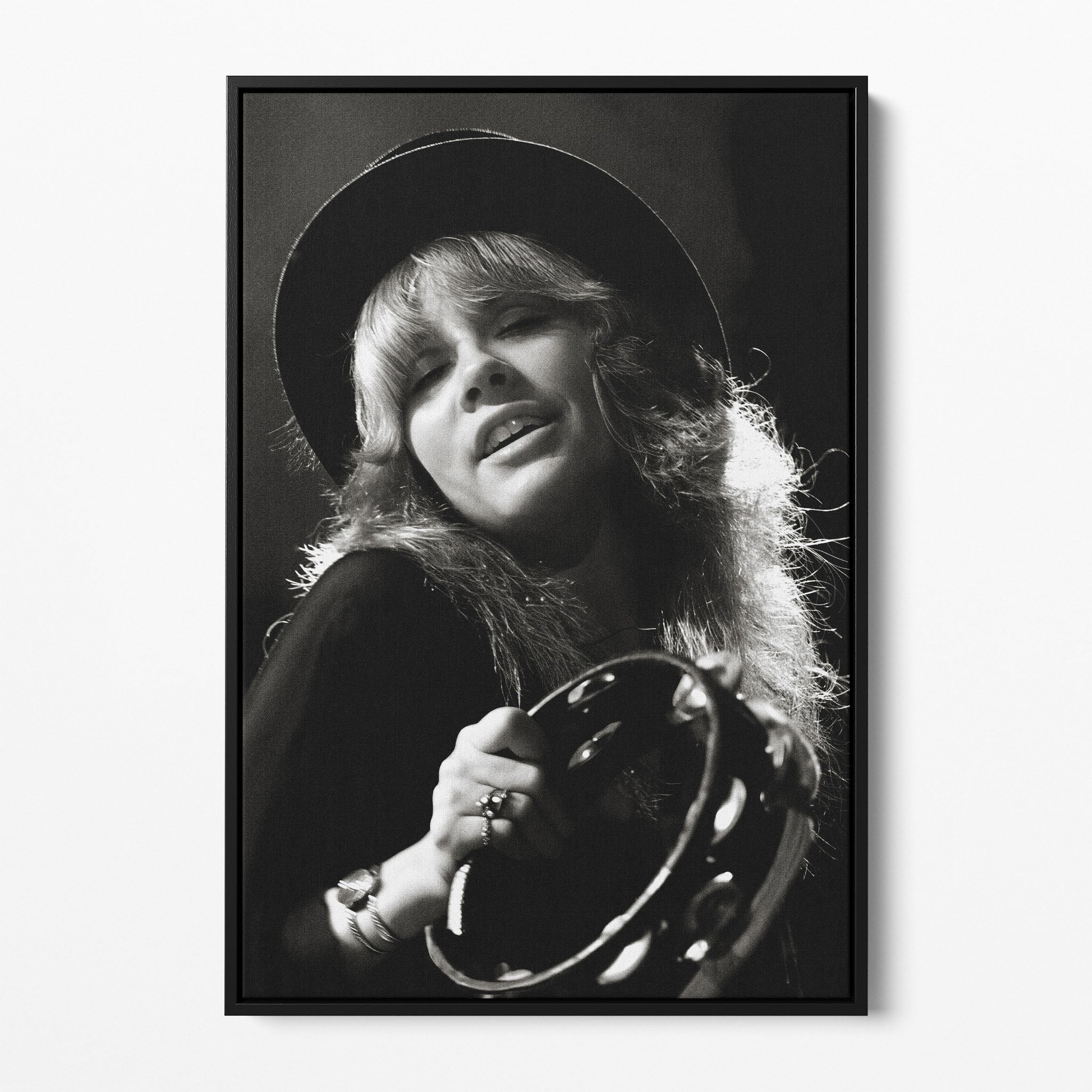Front view of the Stevie Nicks 1977 Oakland black and white canvas in a black floating frame