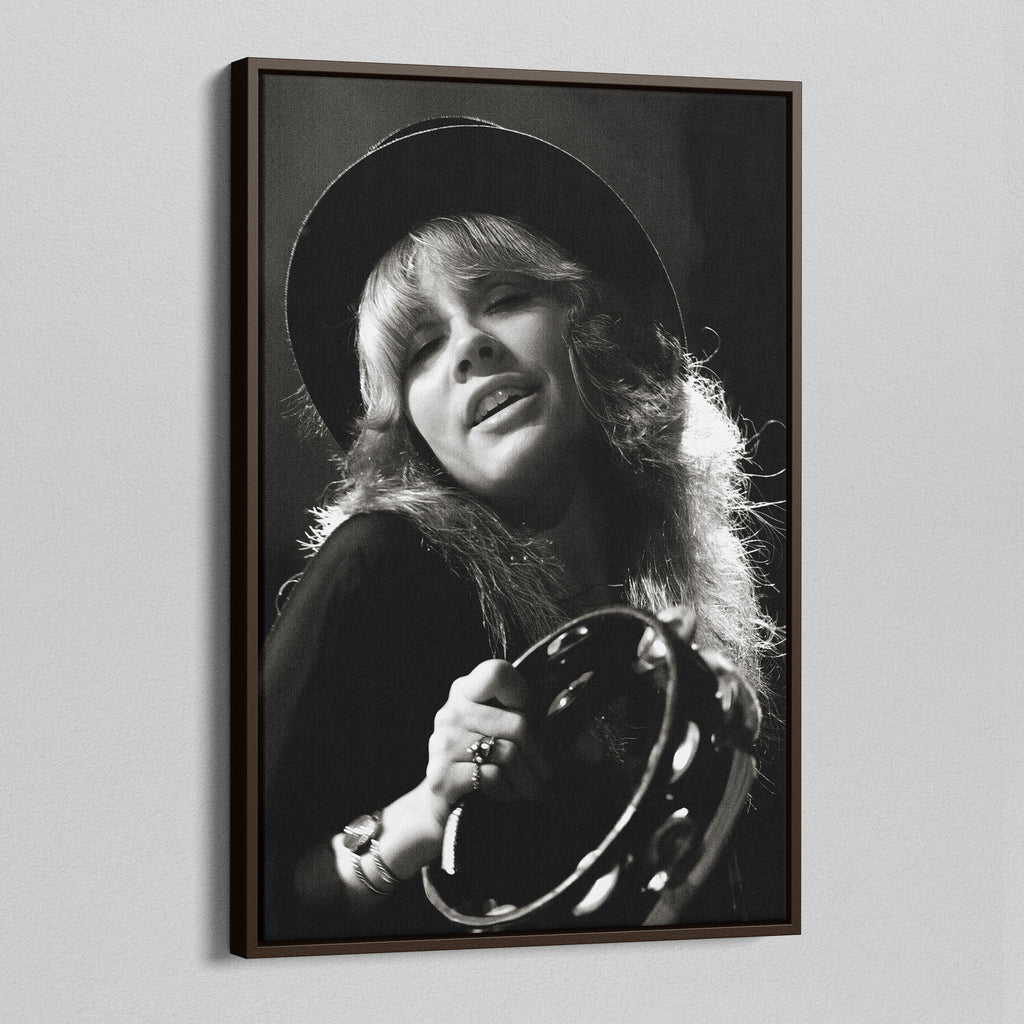Angled view of the Stevie Nicks 1977 Oakland black and white canvas in a dark walnut floating frame