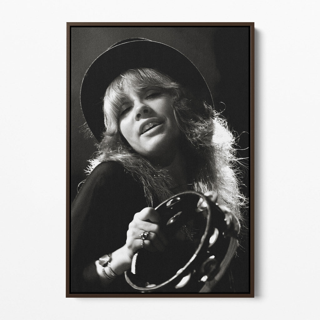 Front view of the Stevie Nicks 1977 Oakland black and white canvas in a dark walnut floating frame