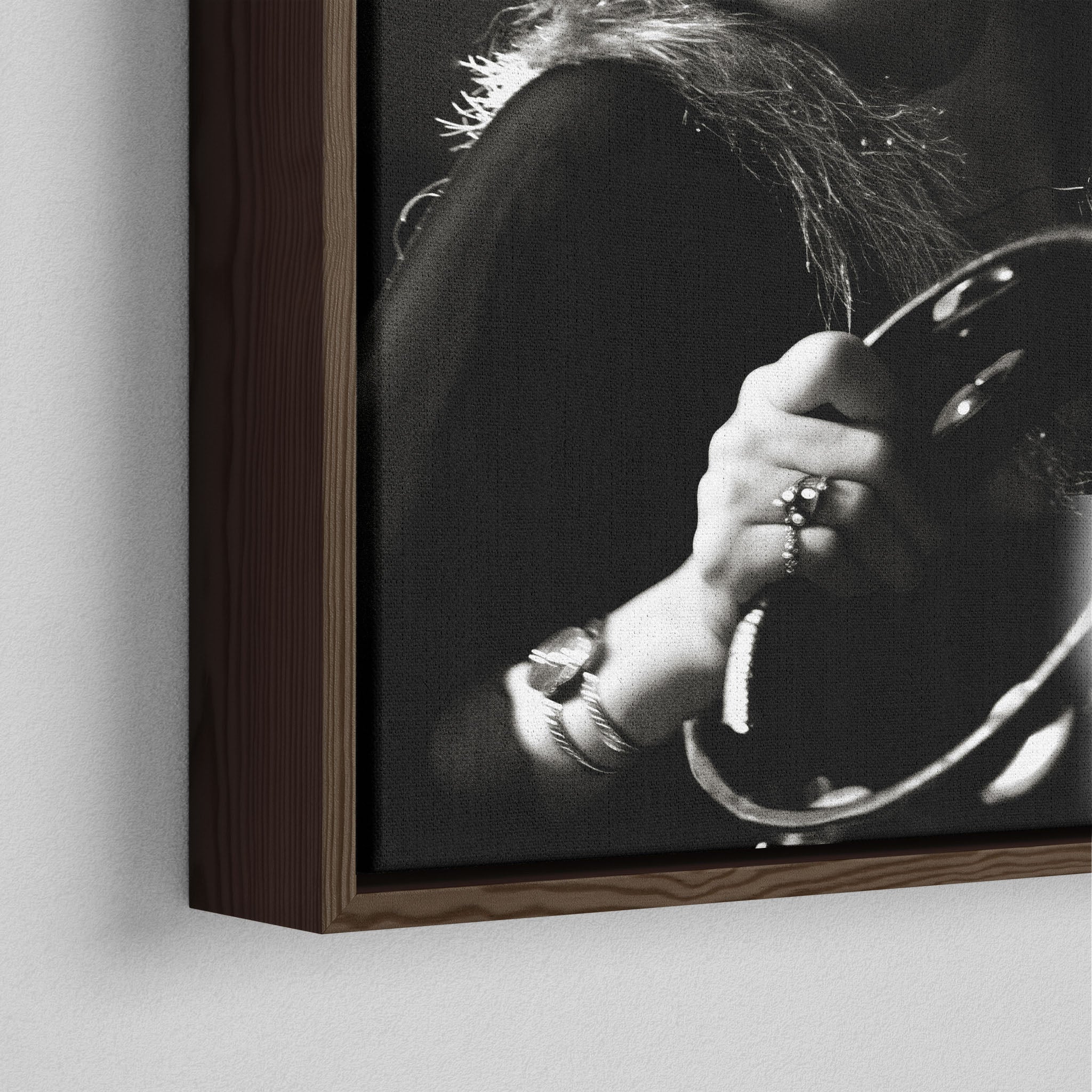 Corner close-up of the dark walnut floating frame on the Stevie Nicks 1977 Oakland black and white canvas