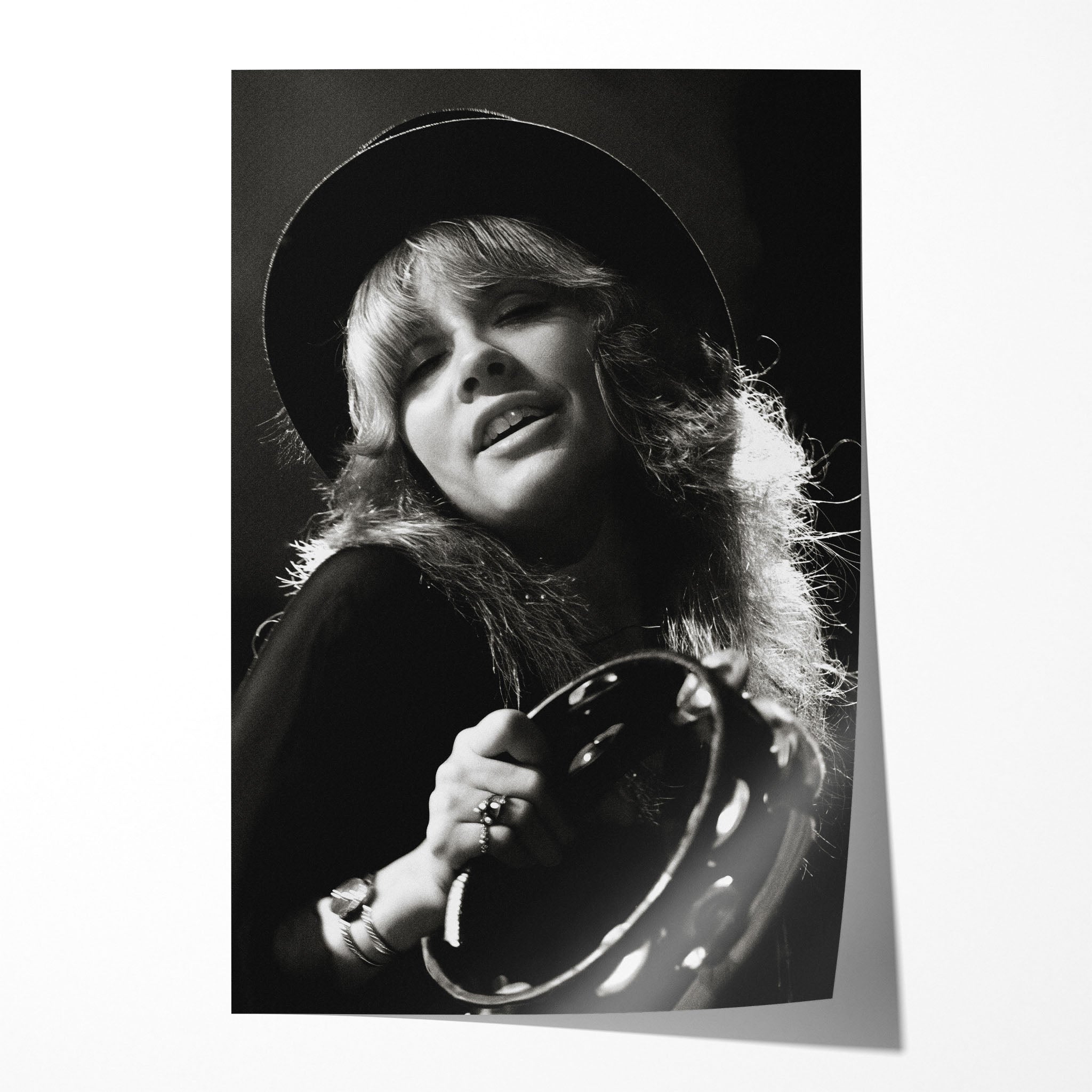 Stevie Nicks Fleetwood Mac 1977 Oakland Day on the Green black and white concert portrait with top hat and tambourine, unframed poster preview
