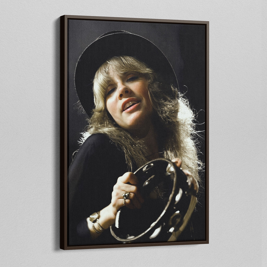 Angled view of the Stevie Nicks 1977 Oakland colour canvas in a dark walnut floating frame