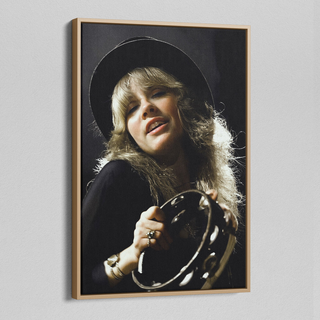 Angled view of the Stevie Nicks 1977 Oakland colour canvas in a natural oak floating frame