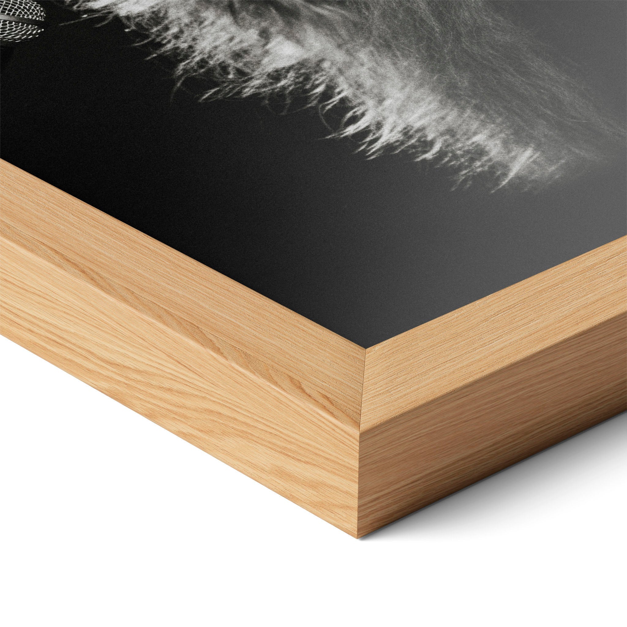 Corner close-up of the Stevie Nicks Rumours era black and white poster in a natural oak frame