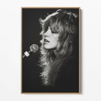 Front view of the Stevie Nicks Rumours era black and white canvas in a natural oak floating frame