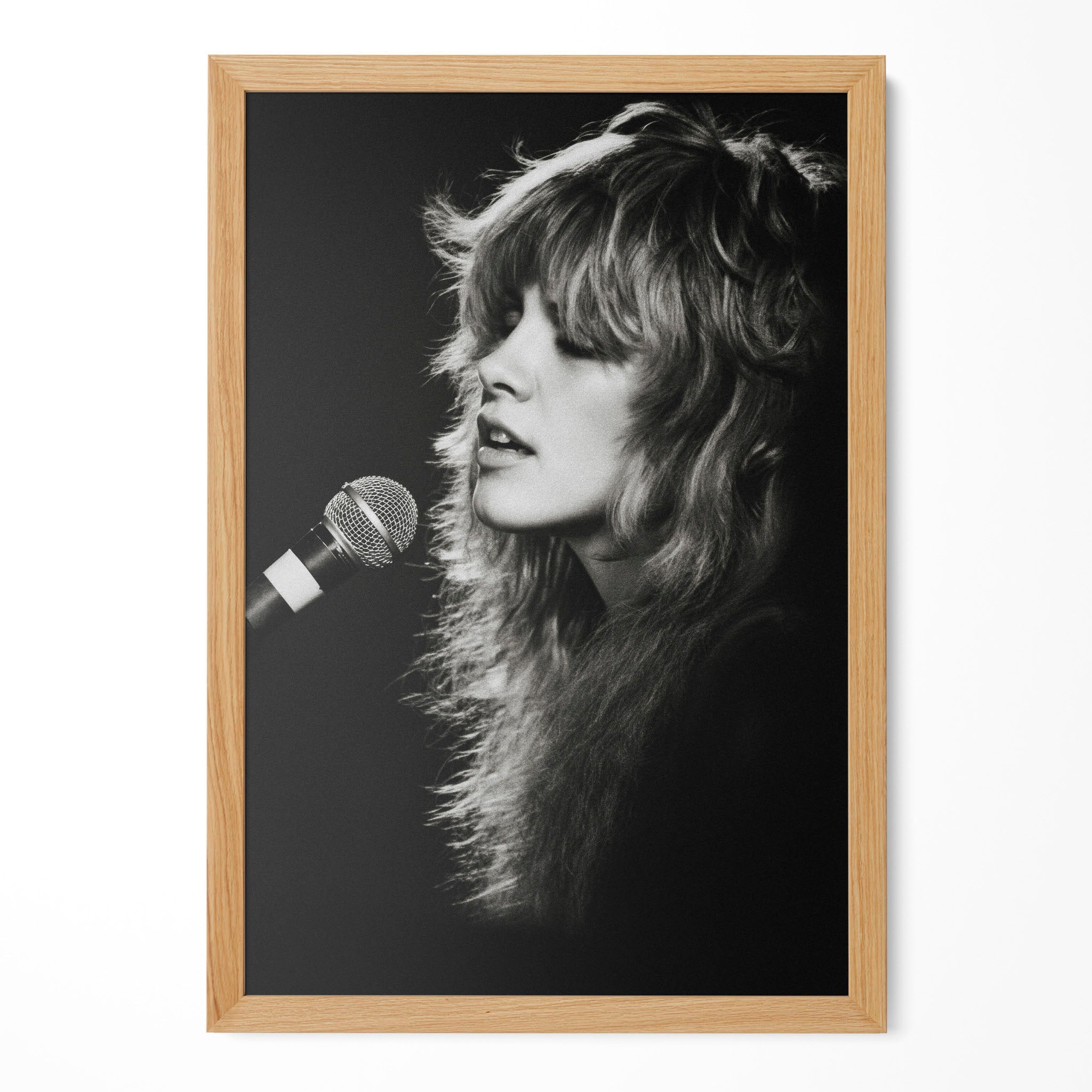 Stevie Nicks Rumours era black and white concert portrait in a natural oak poster frame