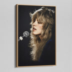Angled view of the Stevie Nicks Rumours era colorized canvas in a natural oak floating frame