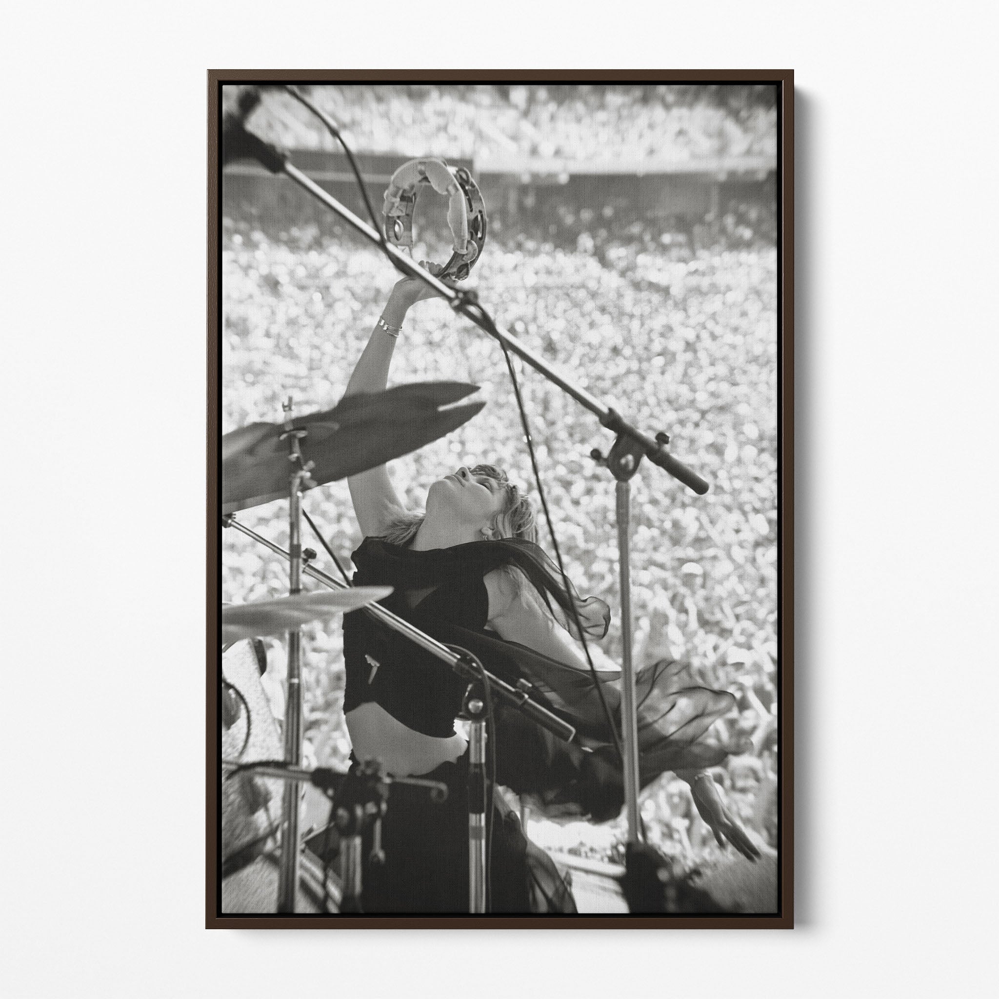 Front view of the Stevie Nicks 1976 Oakland black and white canvas in a dark walnut floating frame