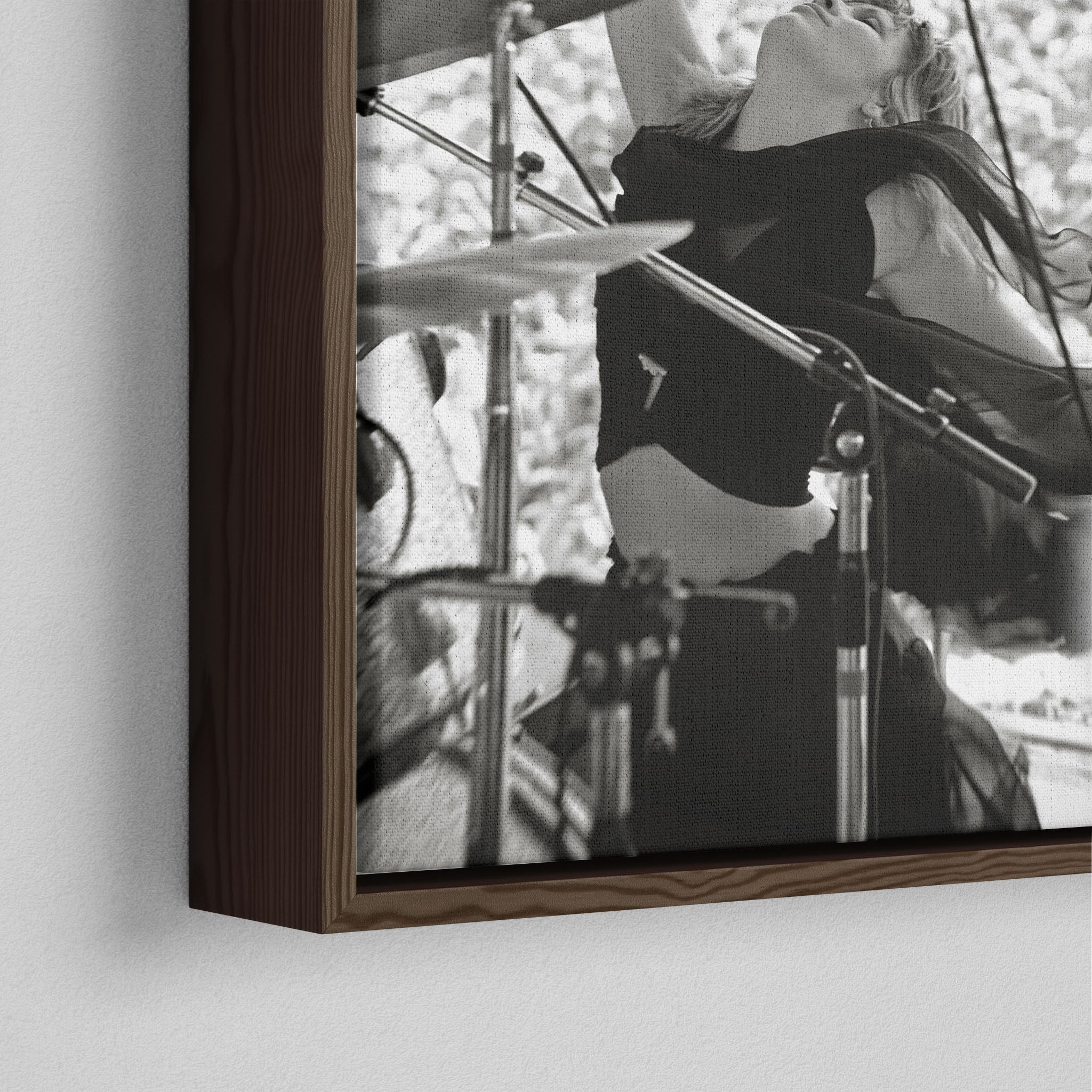 Corner close-up of the dark walnut floating frame on the Stevie Nicks 1976 Oakland black and white canvas