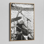 Angled view of the Stevie Nicks 1976 Oakland black and white canvas in a natural oak floating frame