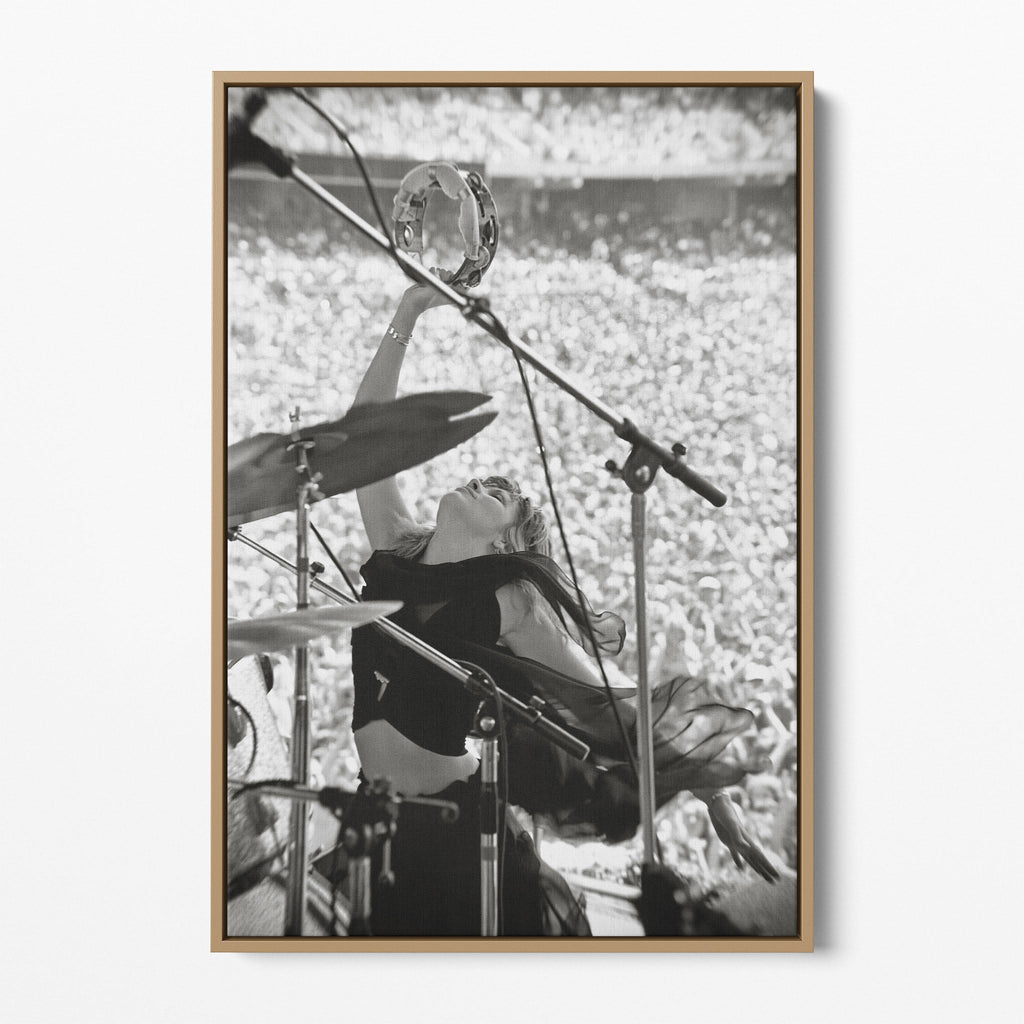 Front view of the Stevie Nicks 1976 Oakland black and white canvas in a natural oak floating frame