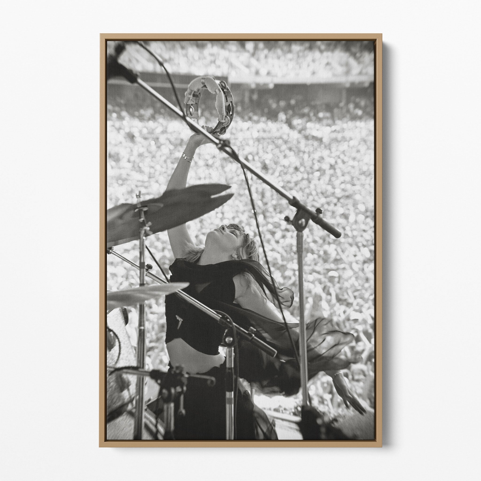 Front view of the Stevie Nicks 1976 Oakland black and white canvas in a natural oak floating frame