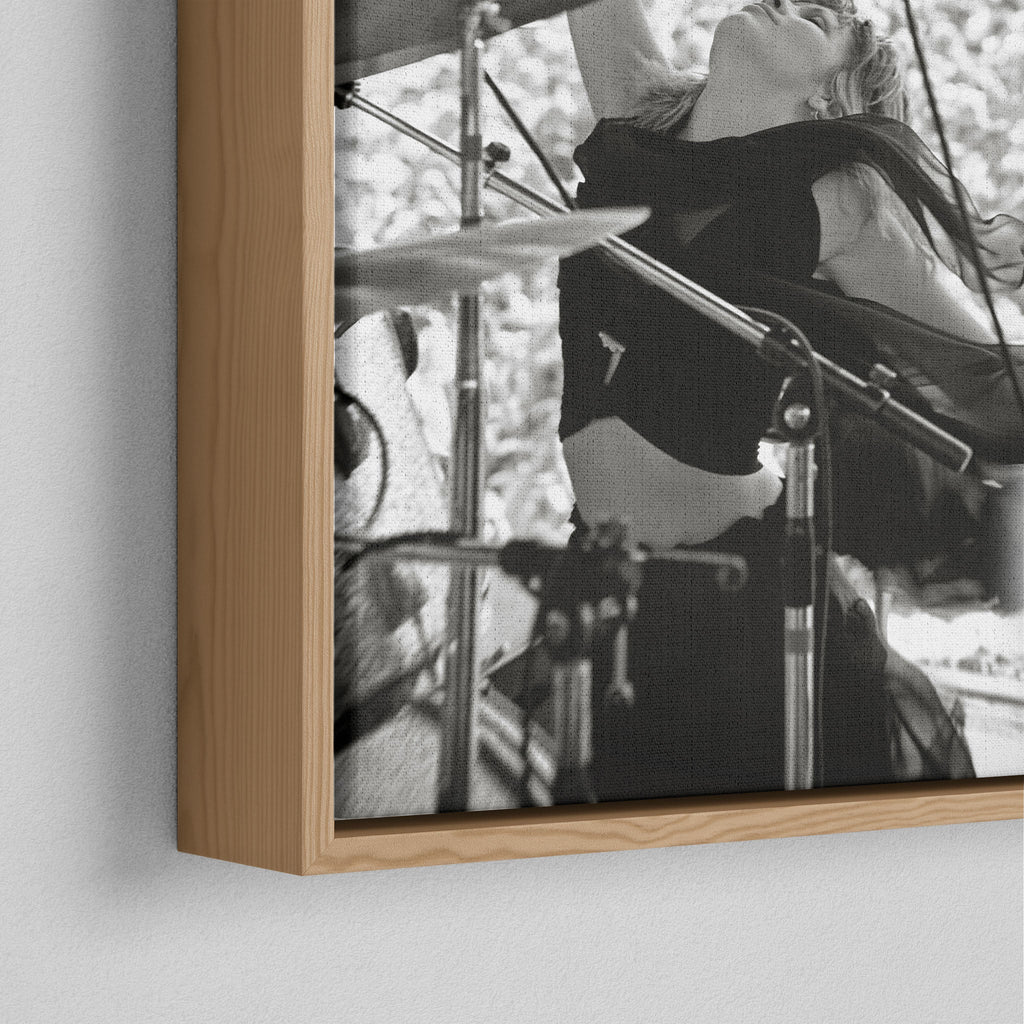 Corner close-up of the natural oak floating frame on the Stevie Nicks 1976 Oakland black and white canvas