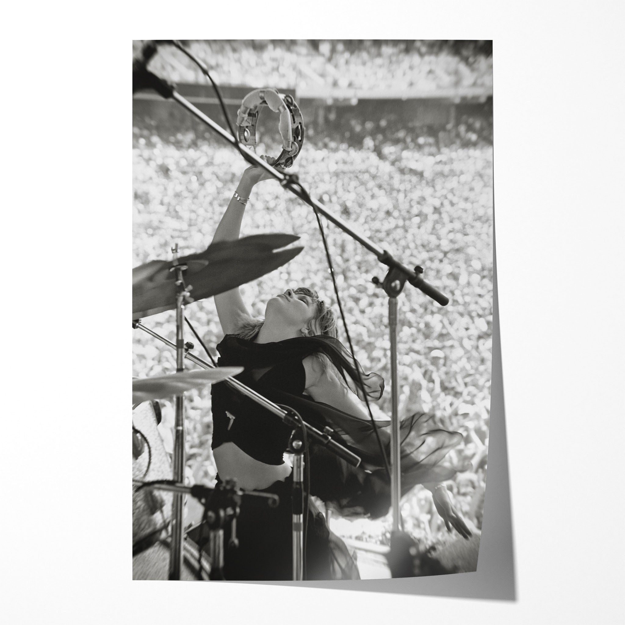 Stevie Nicks Fleetwood Mac 1976 Oakland Day on the Green black and white concert portrait raising a tambourine, unframed poster preview