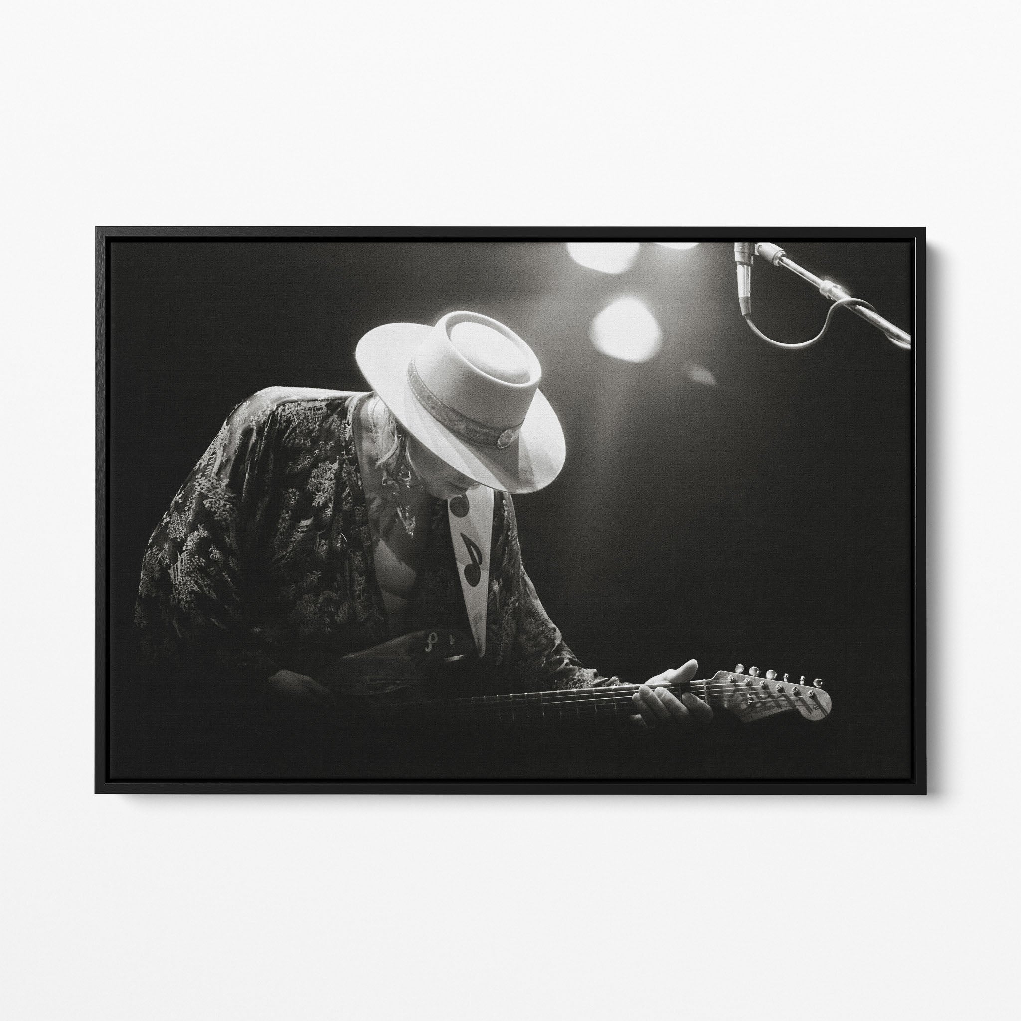 Front view of the Stevie Ray Vaughan 1985 Laramie black and white canvas in a black floating frame