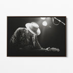 Front view of the Stevie Ray Vaughan 1985 Laramie black and white canvas in a dark walnut floating frame