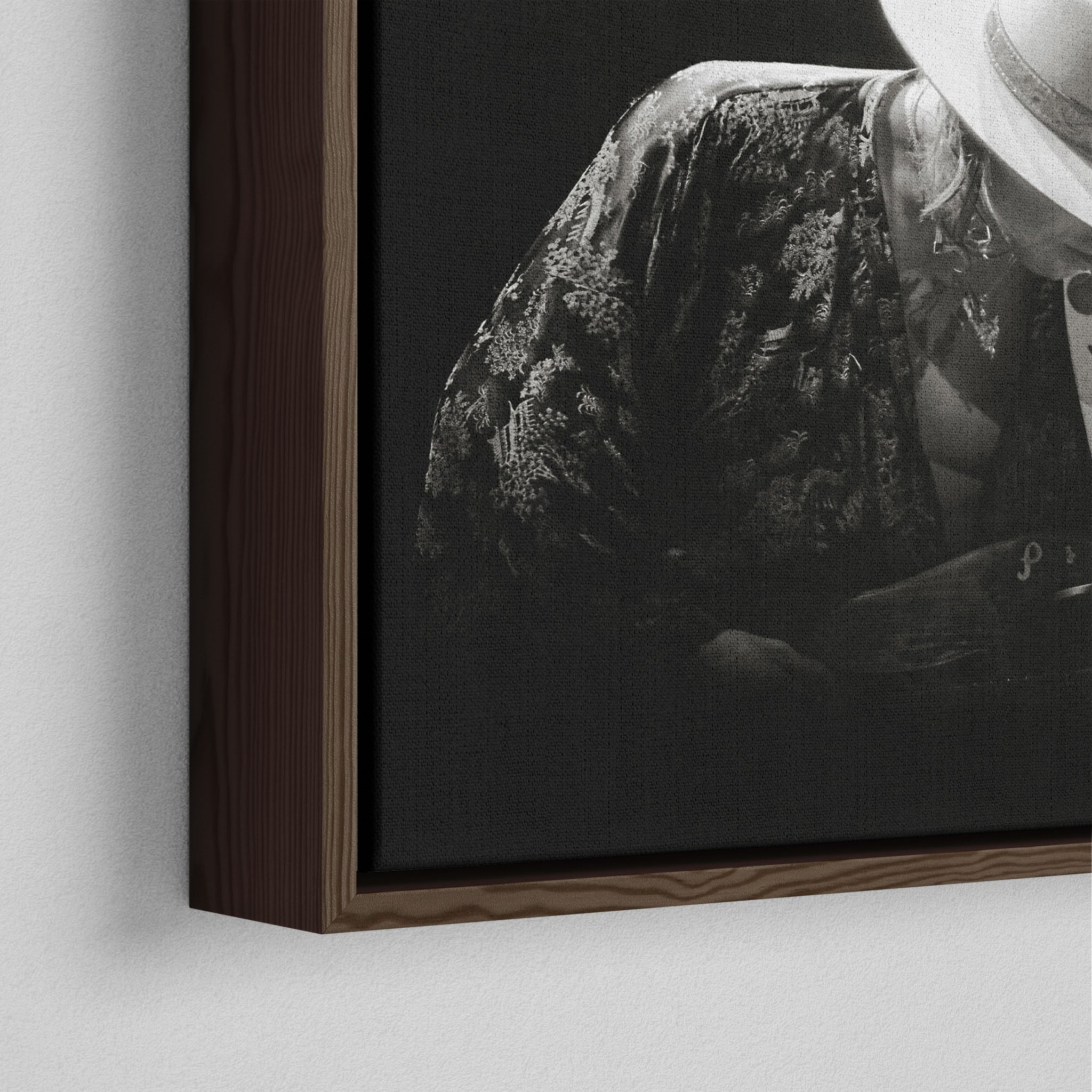 Corner close-up of the dark walnut floating frame on the Stevie Ray Vaughan 1985 Laramie black and white canvas