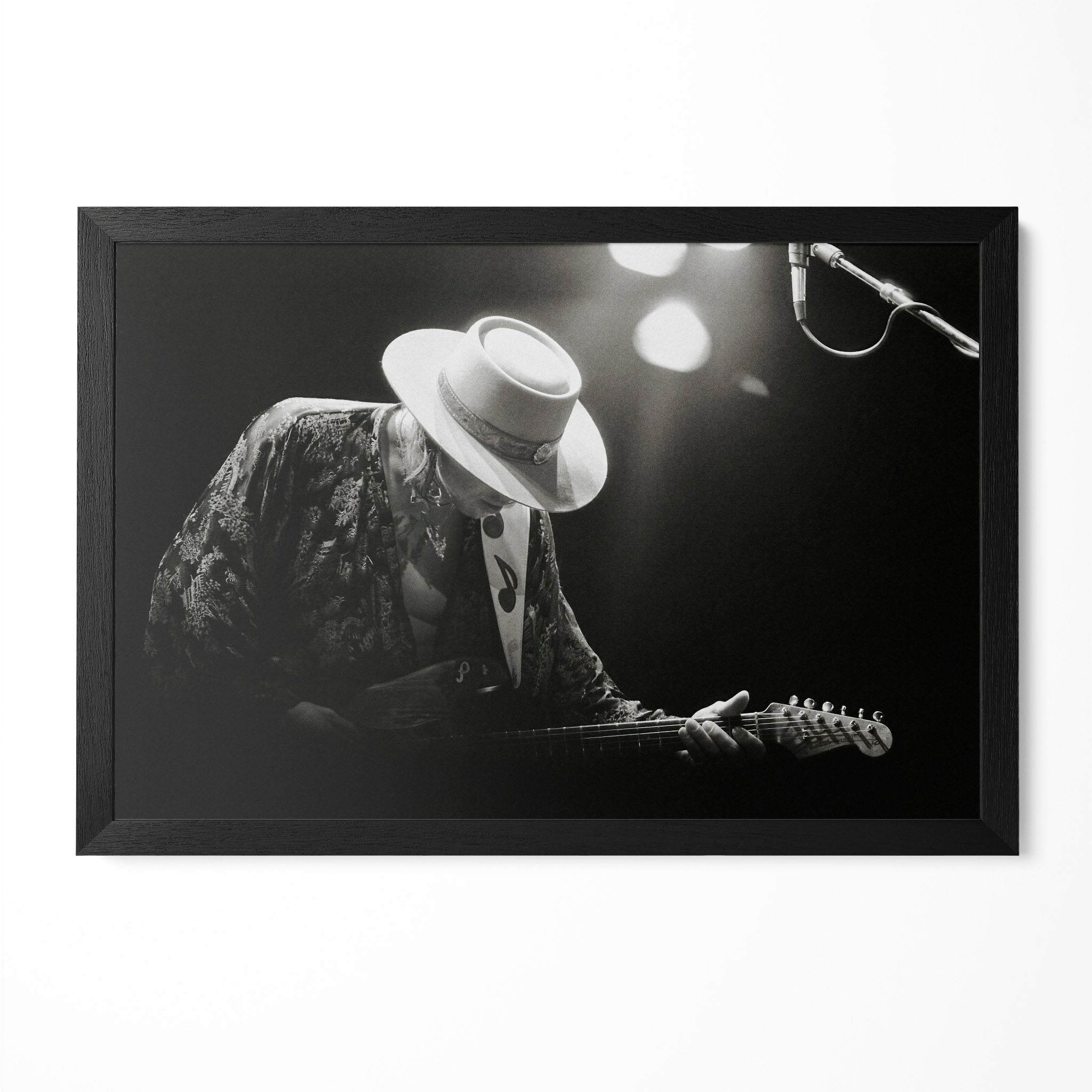 Stevie Ray Vaughan 1985 Laramie Wyoming black and white blues concert portrait in a classic black poster frame