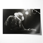Stevie Ray Vaughan 1985 Soul to Soul Tour black and white concert portrait with Fender Stratocaster and wide-brimmed hat, unframed poster preview
