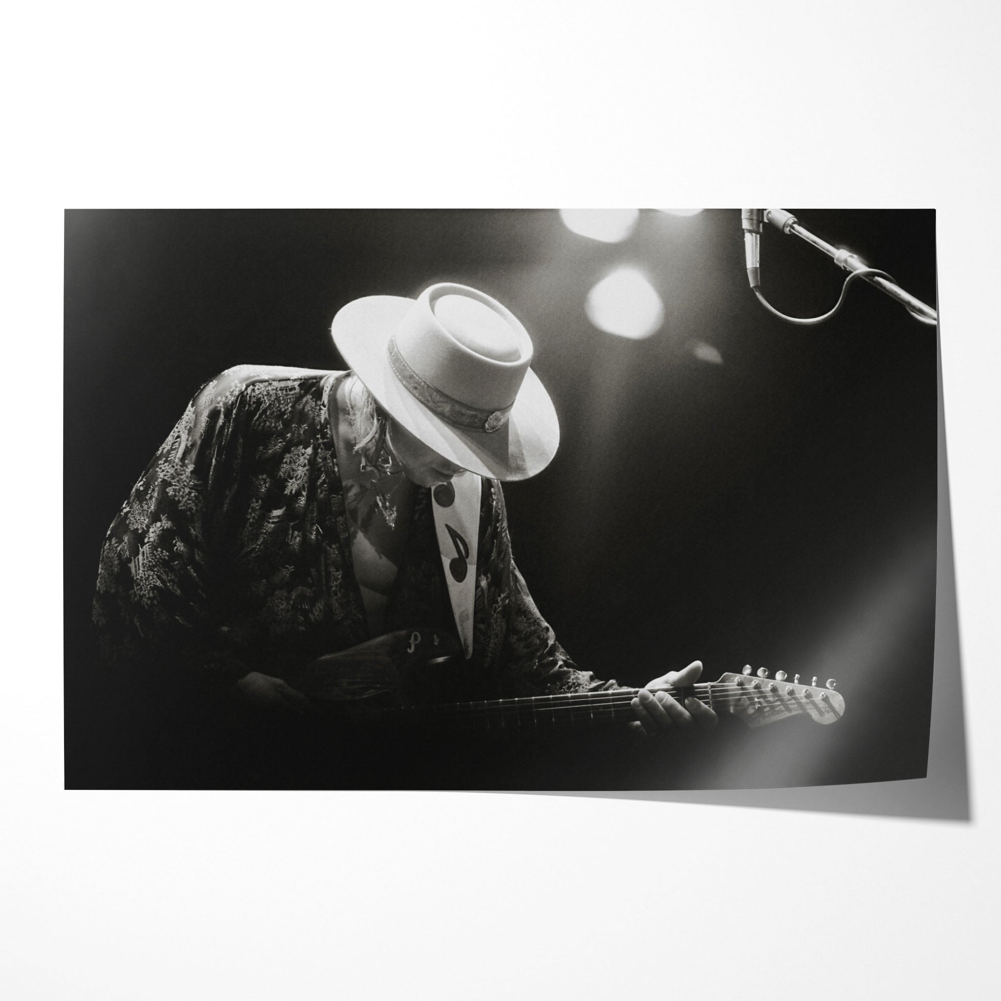 Stevie Ray Vaughan 1985 Soul to Soul Tour black and white concert portrait with Fender Stratocaster and wide-brimmed hat, unframed poster preview