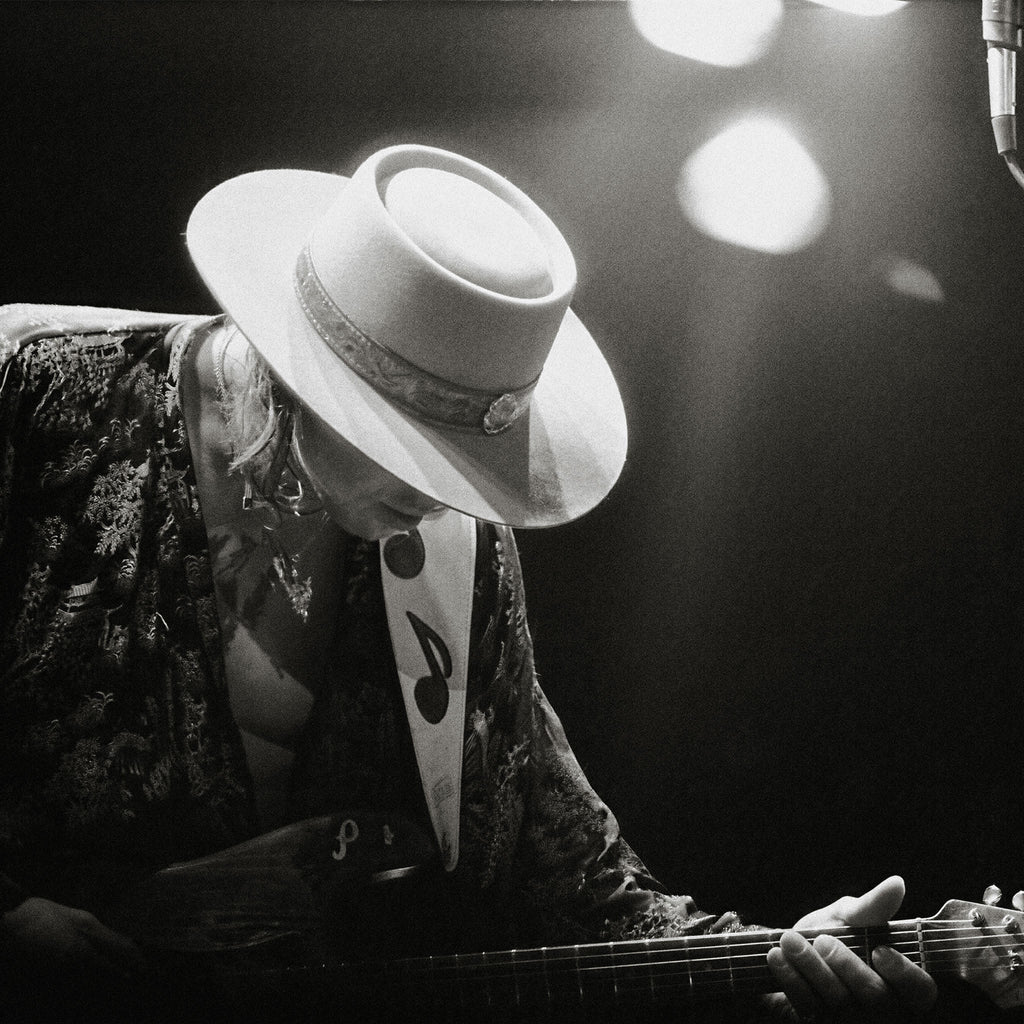 Medium zoom highlighting the crisp detail and deep contrast of the Stevie Ray Vaughan 1985 Laramie black and white print