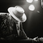 Medium zoom highlighting the crisp detail and deep contrast of the Stevie Ray Vaughan 1985 Laramie black and white print