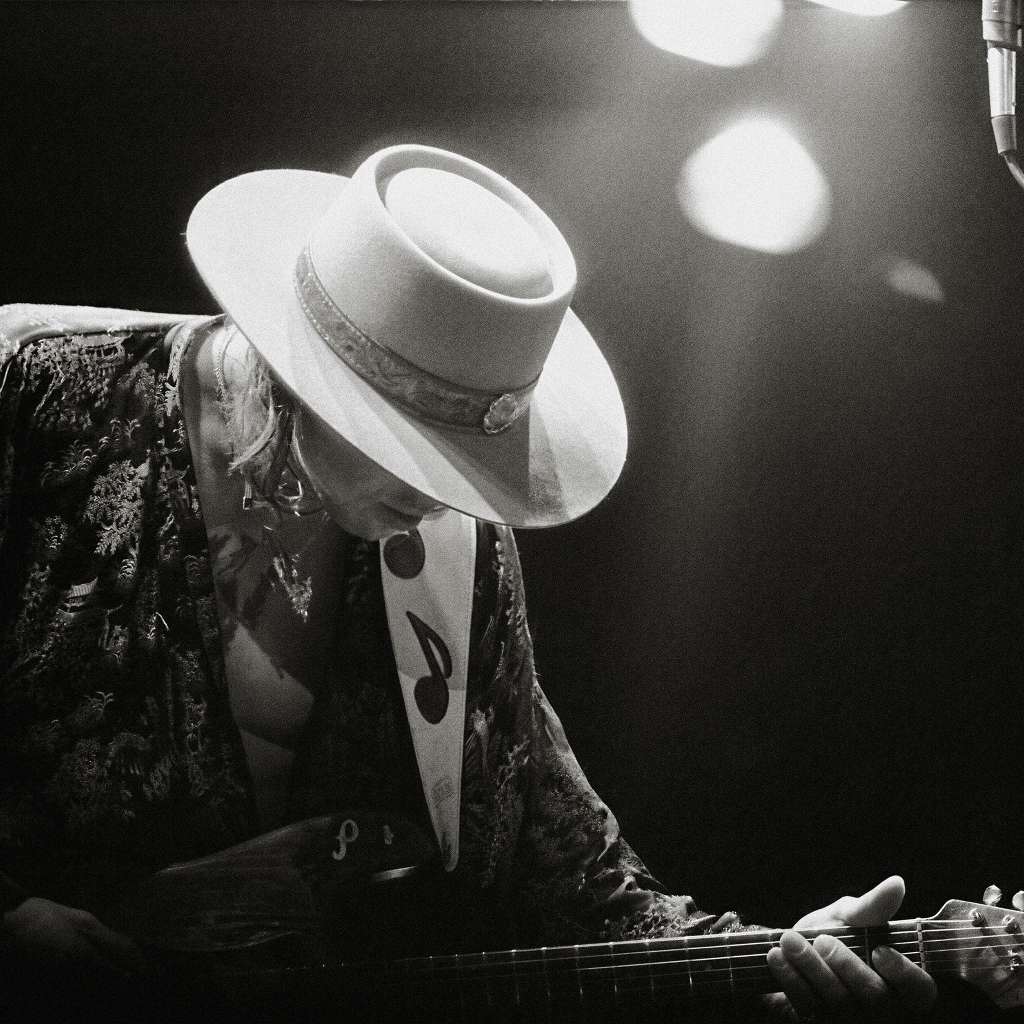 Medium zoom highlighting the crisp detail and deep contrast of the Stevie Ray Vaughan 1985 Laramie black and white print