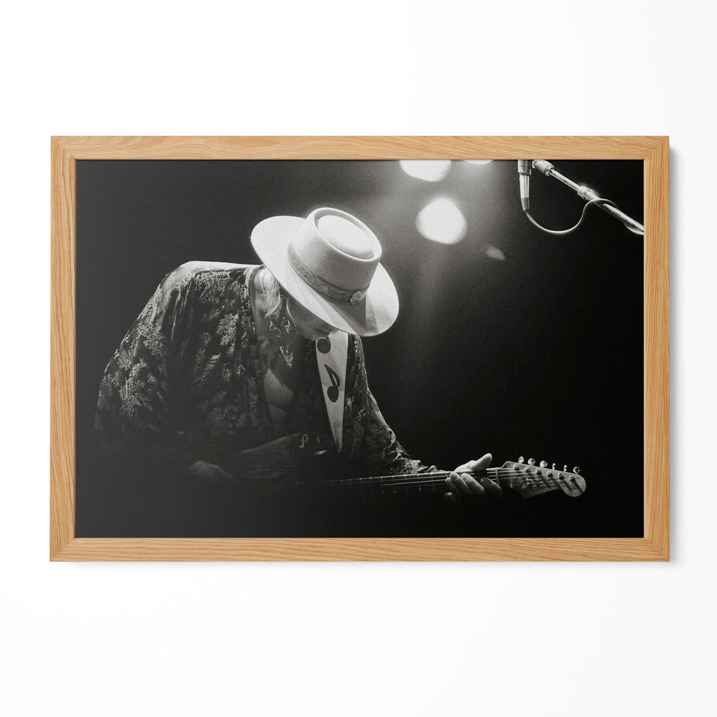 Stevie Ray Vaughan 1985 Laramie Wyoming black and white blues concert portrait in a natural oak poster frame