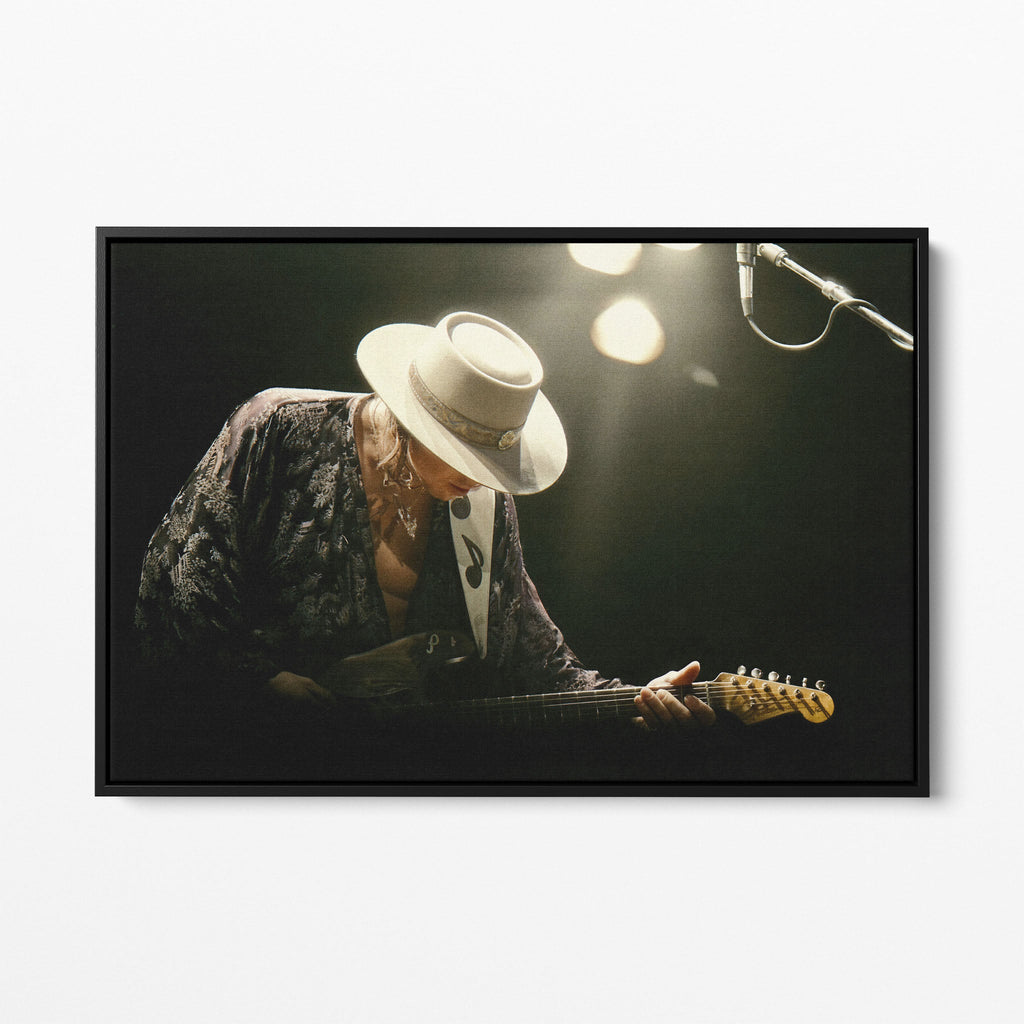 Front view of the Stevie Ray Vaughan 1985 Laramie colorized canvas in a black floating frame