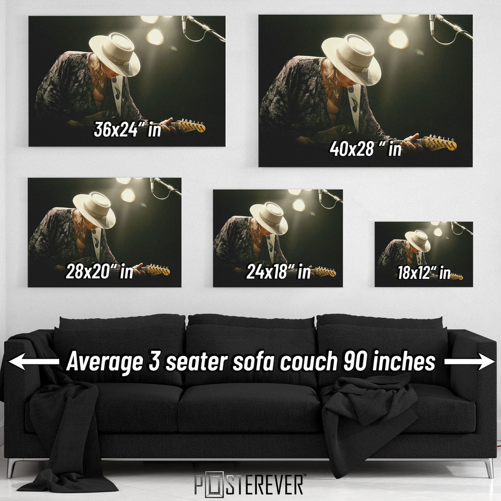Wall art size comparison chart displaying multiple print dimensions above an average 3-seater sofa