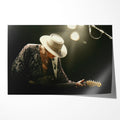 Stevie Ray Vaughan 1985 Soul to Soul Tour colorized concert portrait with Fender Stratocaster and wide-brimmed hat, unframed poster preview