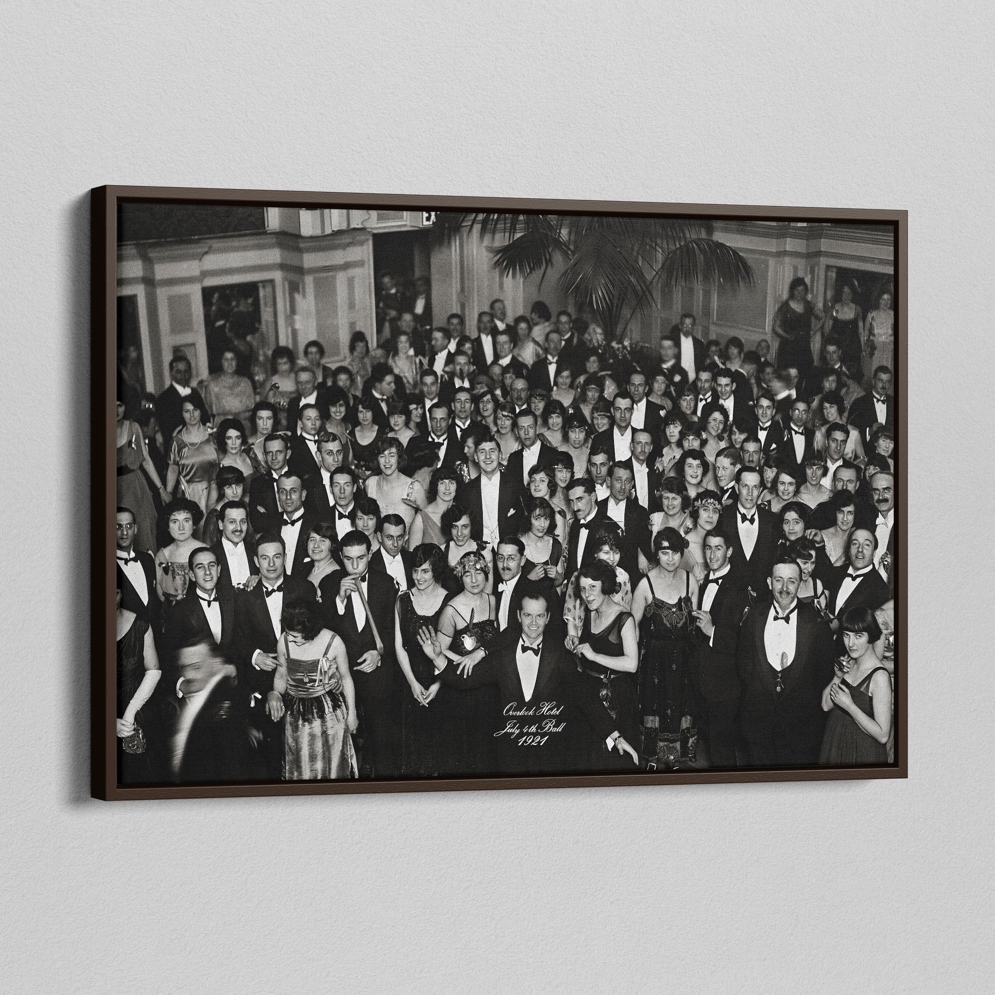 Angled view of the Shining Overlook Hotel 1921 black and white canvas in a dark walnut floating frame