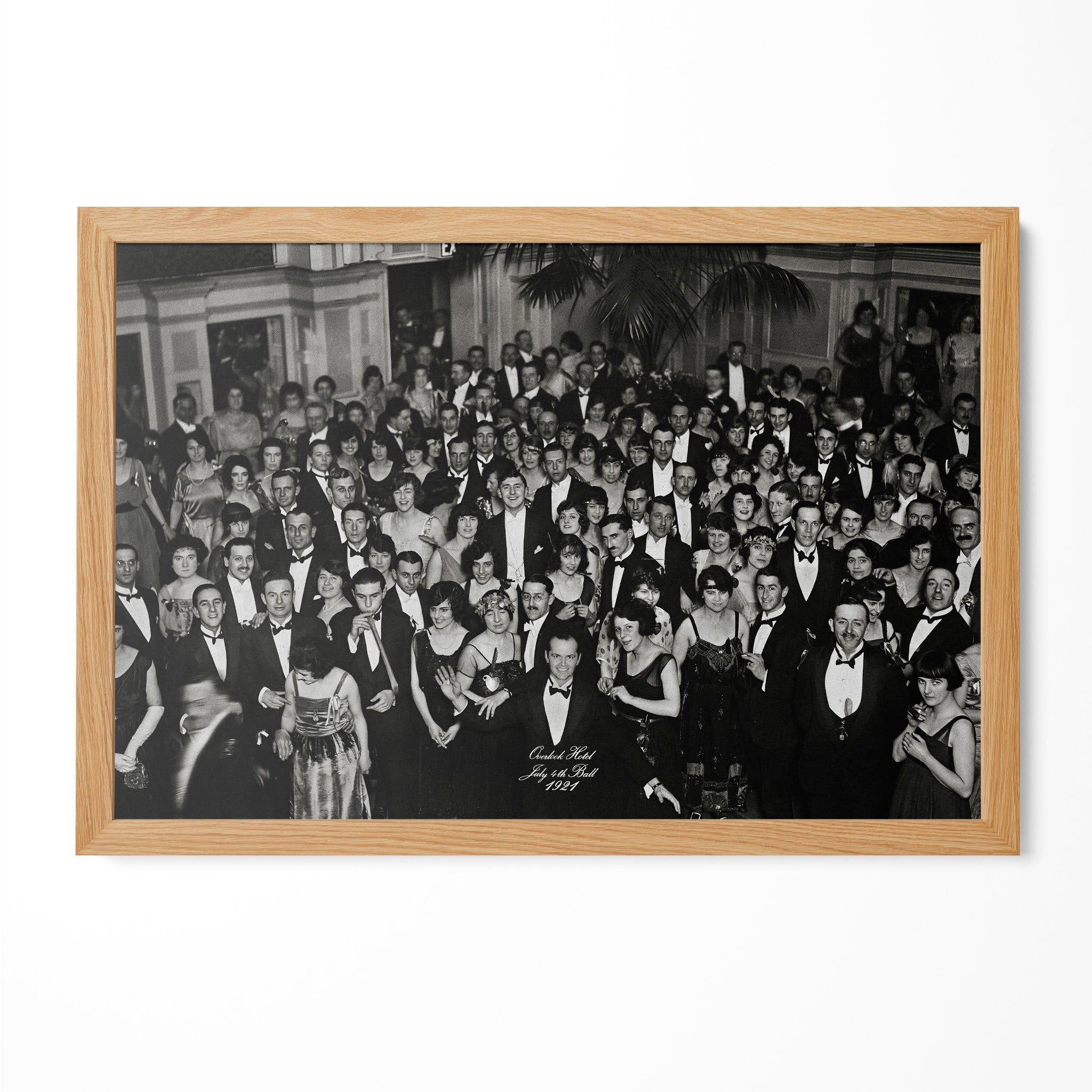 The Shining Overlook Hotel July 4th Ball 1921 black and white final shot in a natural oak poster frame