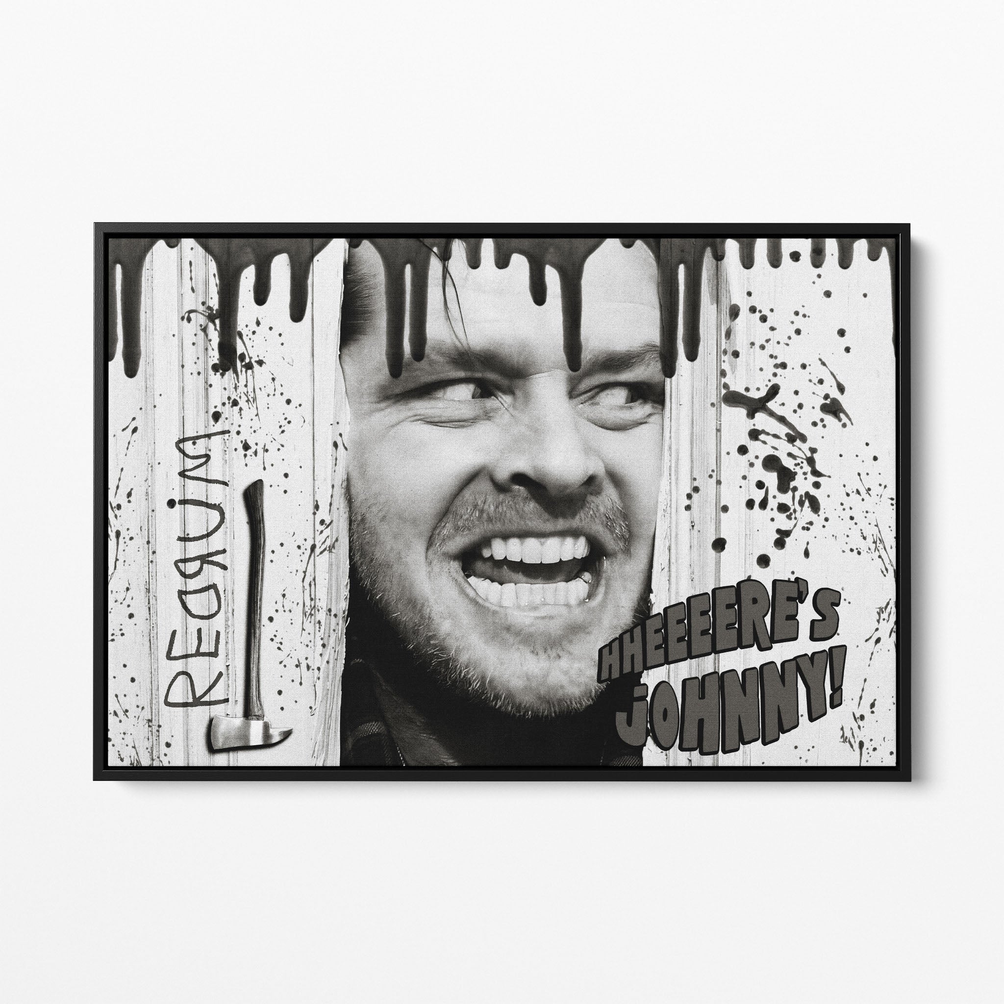 Front view of the Shining Here's Johnny black and white canvas in a black floating frame