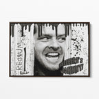 Front view of the Shining Here's Johnny black and white canvas in a dark walnut floating frame