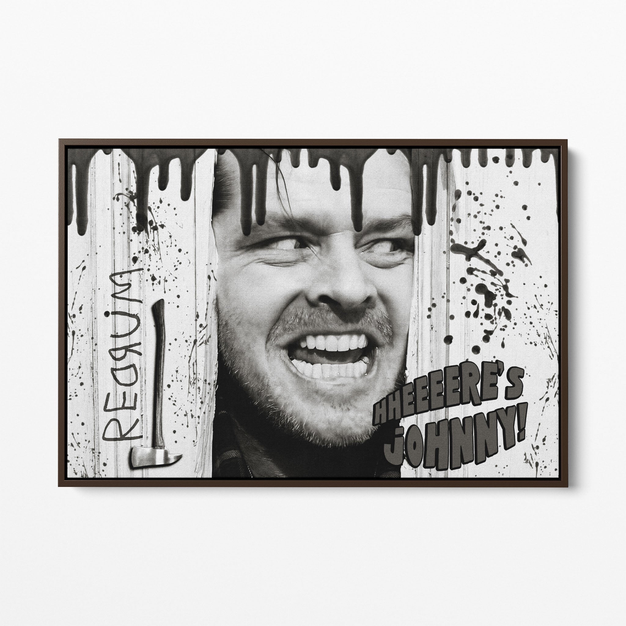 Front view of the Shining Here's Johnny black and white canvas in a dark walnut floating frame