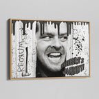 Angled view of the Shining Here's Johnny black and white canvas in a natural oak floating frame